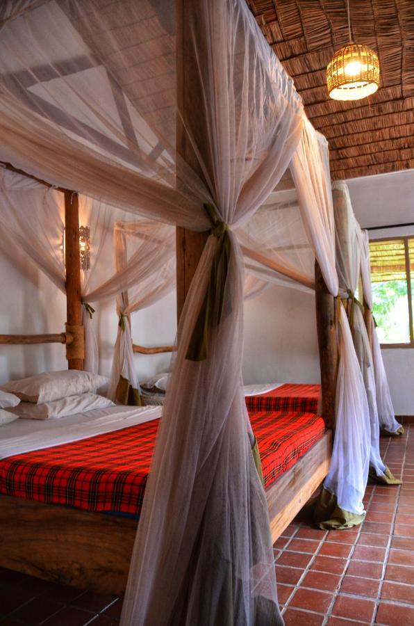 Honey Badger Lodge Moshi Esterno foto
